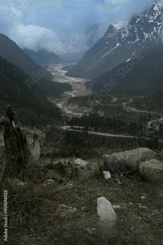 Lachung river flowing through Yumthang Valley or Sikkim Valley of Flowers sanctuary, Himalayan mountains at North Sikkim, India. Also called Valley of Flowers, home to Shingba Rhododendron Sanctuary, photo