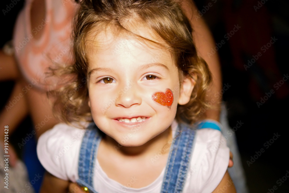 beautiful child's face at a party beautiful child's face at a party