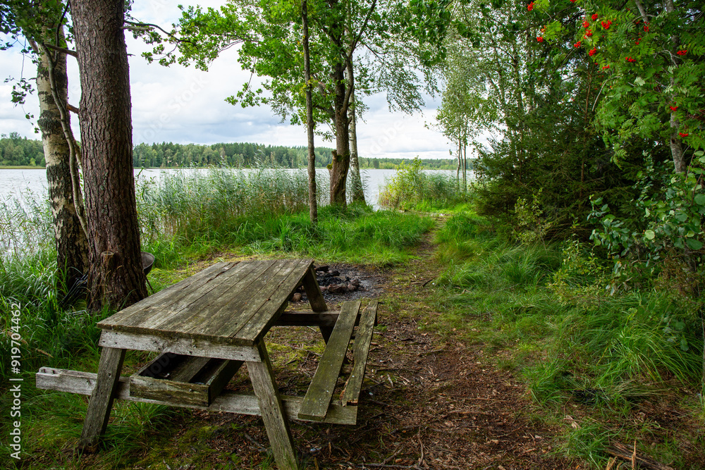 Resting place at the lake Katvari in August on a cloudy day in Katvari in Latvia Resting place at the lake Katvari in August on a cloudy day in Katvari in Latvia