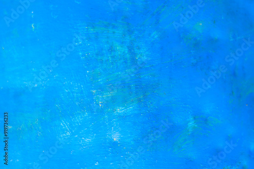 the blue surface of the paint on the wall