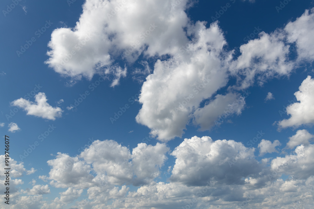 Sky replacement blue fluffy clouds over horizon against vivid blue sky 2 Sky replacement blue fluffy clouds over horizon against vivid blue sky 2