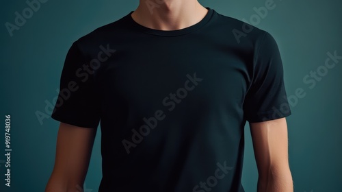 Realistic black t-shirt on young man, blank space for promotional advertisement placed. Empty business concept. The generation of AI