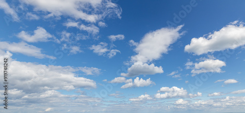 Sky replacement white and gray puffy clouds against blue skies