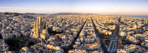 Photography Aerial panoramic view of Barcelona, Spain, including its iconic Basilica Sagrada