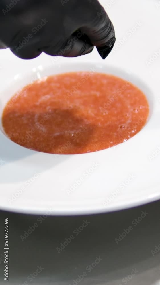 Tomato gazpacho Spanish cold soup with pepper and garlic, Spanish traditional cuisine, chef cooking dinner. Step by step cooking process Tomato gazpacho Spanish cold soup with pepper and garlic, Spanish traditional cuisine, chef cooking dinner. Step by step cooking process