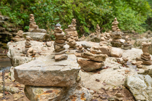 Pyramids made of flat stones in a dry mountain river bed