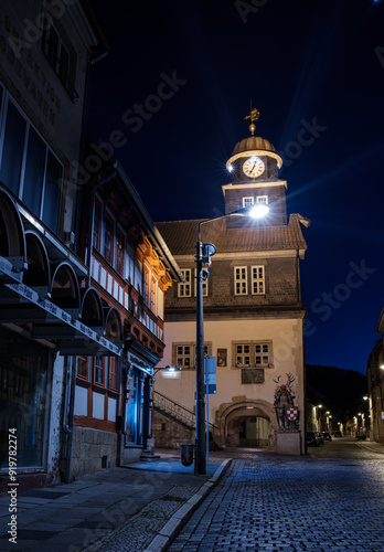 Obraz na płótnie Street alley in the small town of Schwabisch Hall, with houses and buildings with typical German architecture and street lanterns, at night. w salonie