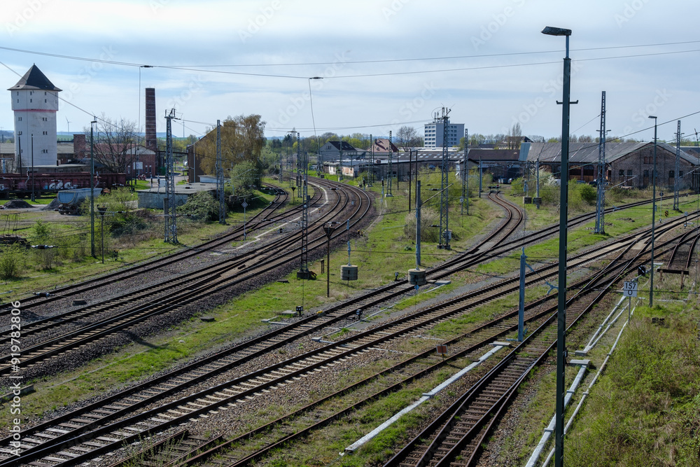 Railway outdoors on beautiful summer day. Industrial landscape with rails and railway.