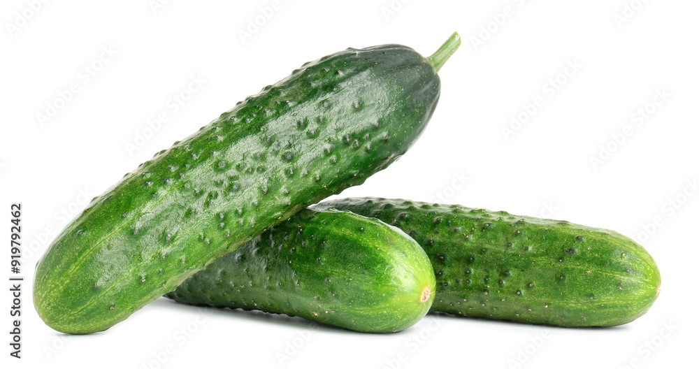 Three fresh green cucumbers isolated on white Three fresh green cucumbers isolated on white