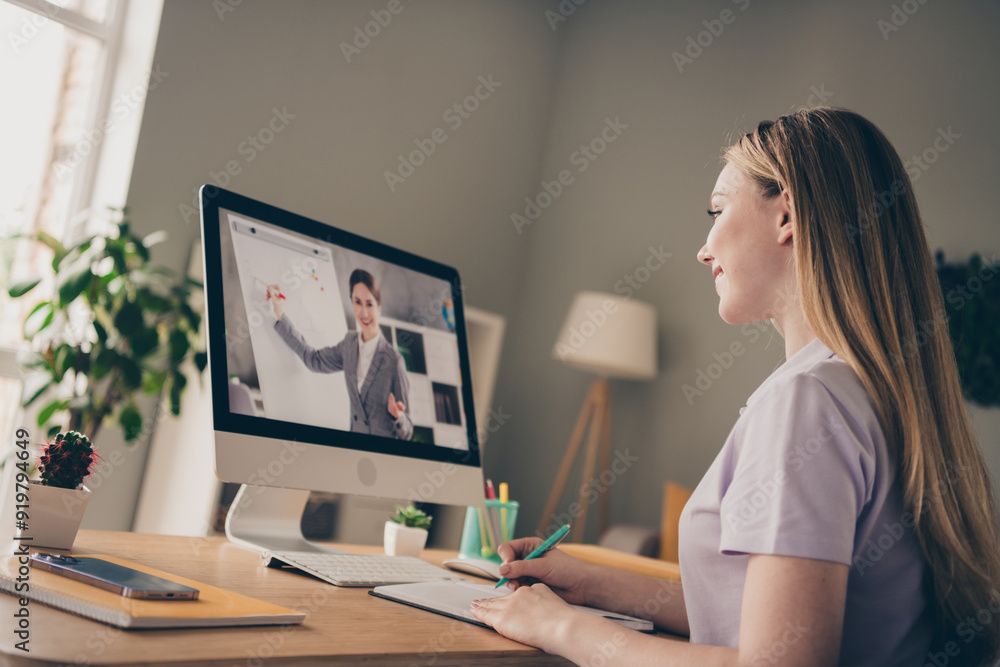 Photo of shiny cute girl dressed purple t-shirt smiling remote zoom education modern gadget indoors house apartment room Photo of shiny cute girl dressed purple t-shirt smiling remote zoom education modern gadget indoors house apartment room
