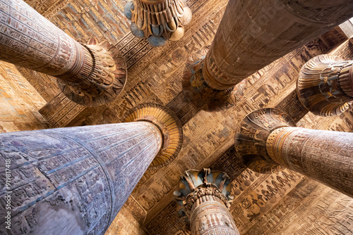 Colored columns and celling in the hypostyle hall of the Temple of Khnum at Esna . Luxor. Egypt. photo