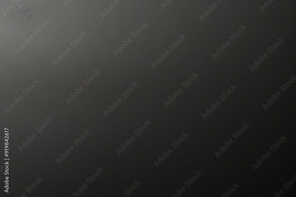 Black foil gradient texture background with uneven surface Black foil gradient texture background with uneven surface