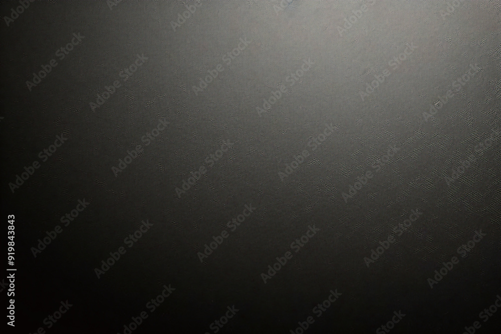 Black foil gradient texture background with uneven surface Black foil gradient texture background with uneven surface