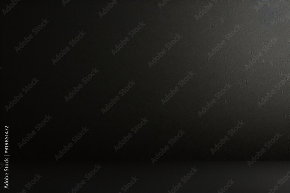 Black foil gradient texture background with uneven surface Black foil gradient texture background with uneven surface