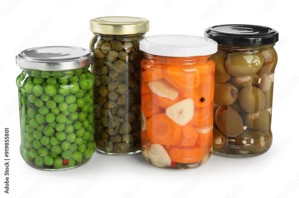Different pickled products in jars isolated on white Different pickled products in jars isolated on white