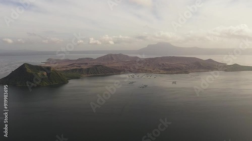 Aerial view of volcano Taal with a crater on an island in the middle of a lake. Tagaytay City, Philippines. photo