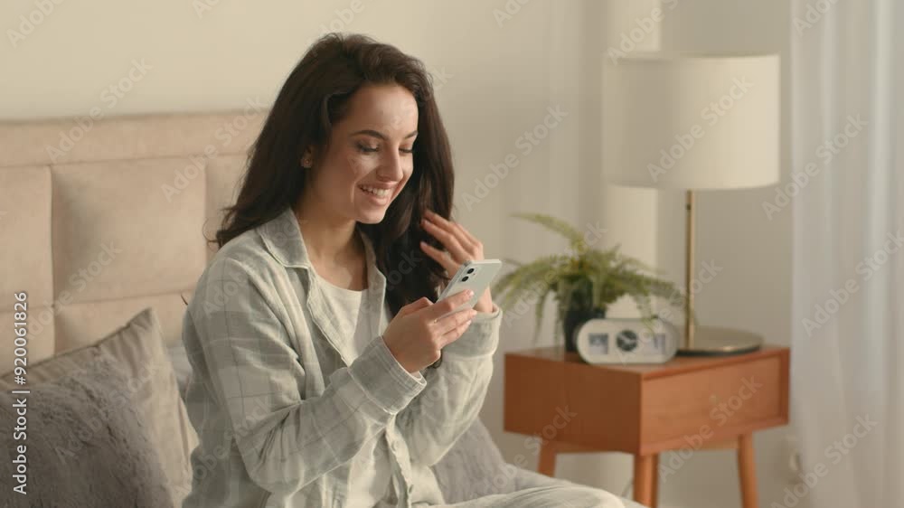 Woman bed bedroom home using mobile phone smartphone telephone chatting texting sms messages girl smiling communicate online female notification connect web technology gossip social media electronic Woman bed bedroom home using mobile phone smartphone telephone chatting texting sms messages girl smiling communicate online female notification connect web technology gossip social media electronic