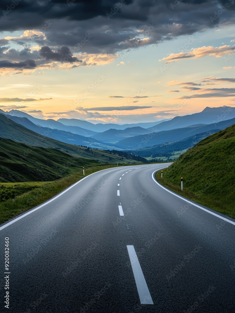 A scenic road winds through lush mountains under a vibrant sky, inviting exploration and adventure in nature's beauty. A scenic road winds through lush mountains under a vibrant sky, inviting exploration and adventure in nature's beauty.