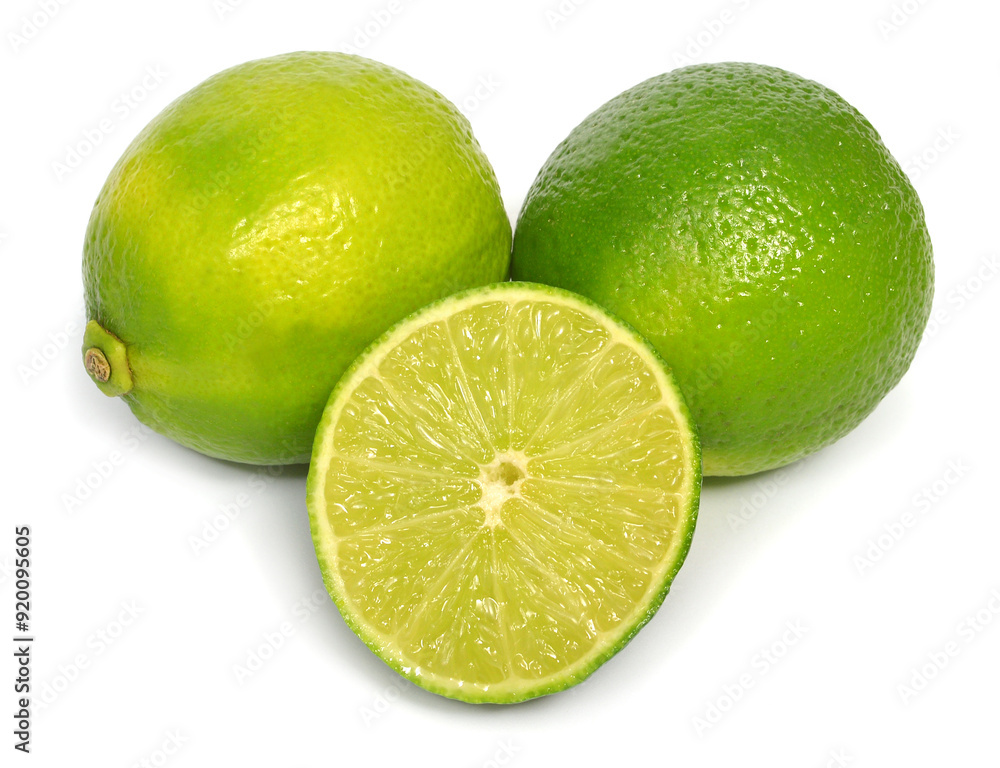 Lime fruit whole and slice isolated on white background Lime fruit whole and slice isolated on white background