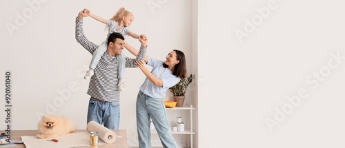 Happy family having fun dur...