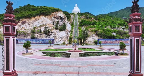 Aerial view of giant Buddha Statue on top of the mountain overlooking the sea Central Vietnam as pray good weather, smooth sea for fishermen fishing easier photo