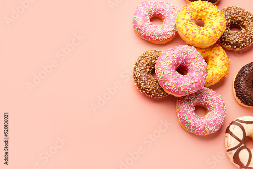 Sweet donuts on pink backgr...