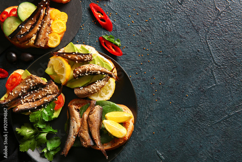 Plate of tasty sandwiches w...