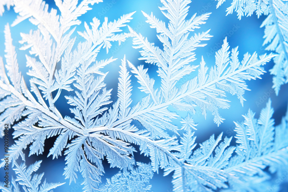 Frosty winter background of snowflakes on glass, christmas new year texture natural blue. Frosty winter background of snowflakes on glass, christmas new year texture natural blue.