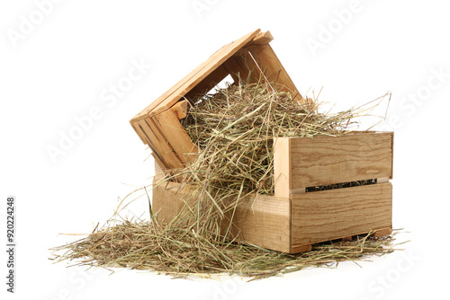 Straw in crates on white ba...