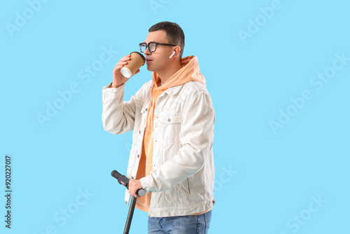 Young man with electric sco...