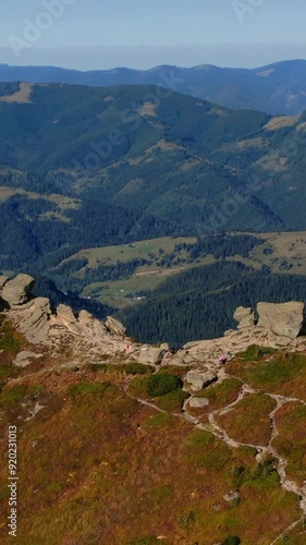 Hoverla (Goverla) the highest peak of the Ukrainian Carpathian mountains. Aerial drone view. Panoramic nature landscape of a valley, forest and hiking trails for travelers. Trekking outdoors.