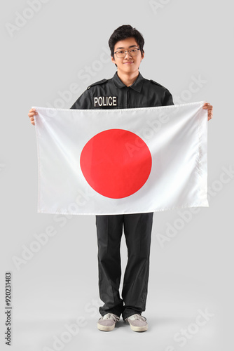Young Asian police officer ...