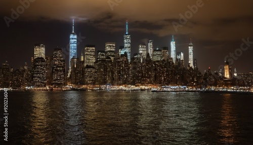 Lower Manhattan skyline during the blue hour with Hudson River in the foreground 18