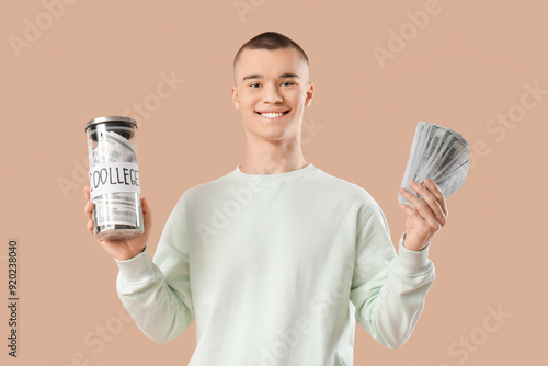 Male student with jar bank ...