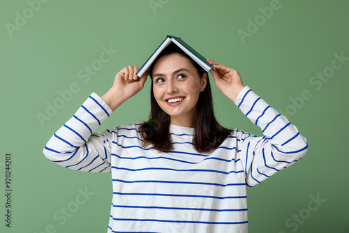 Smiling young woman with bo...