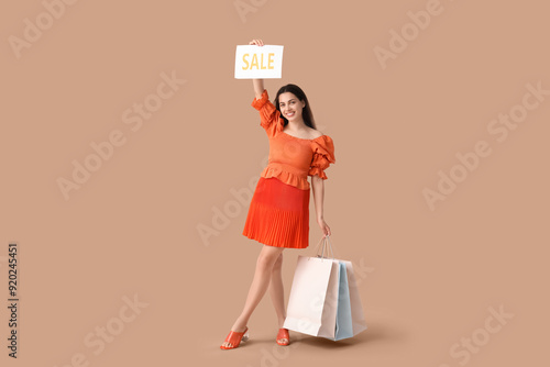 Beautiful young happy woman...