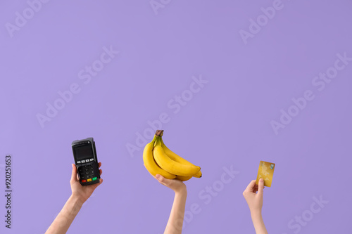 Hands with fresh bananas, p...