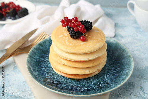 Plate of sweet pancakes wit...