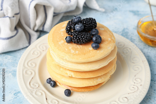 Plate of sweet pancakes wit...