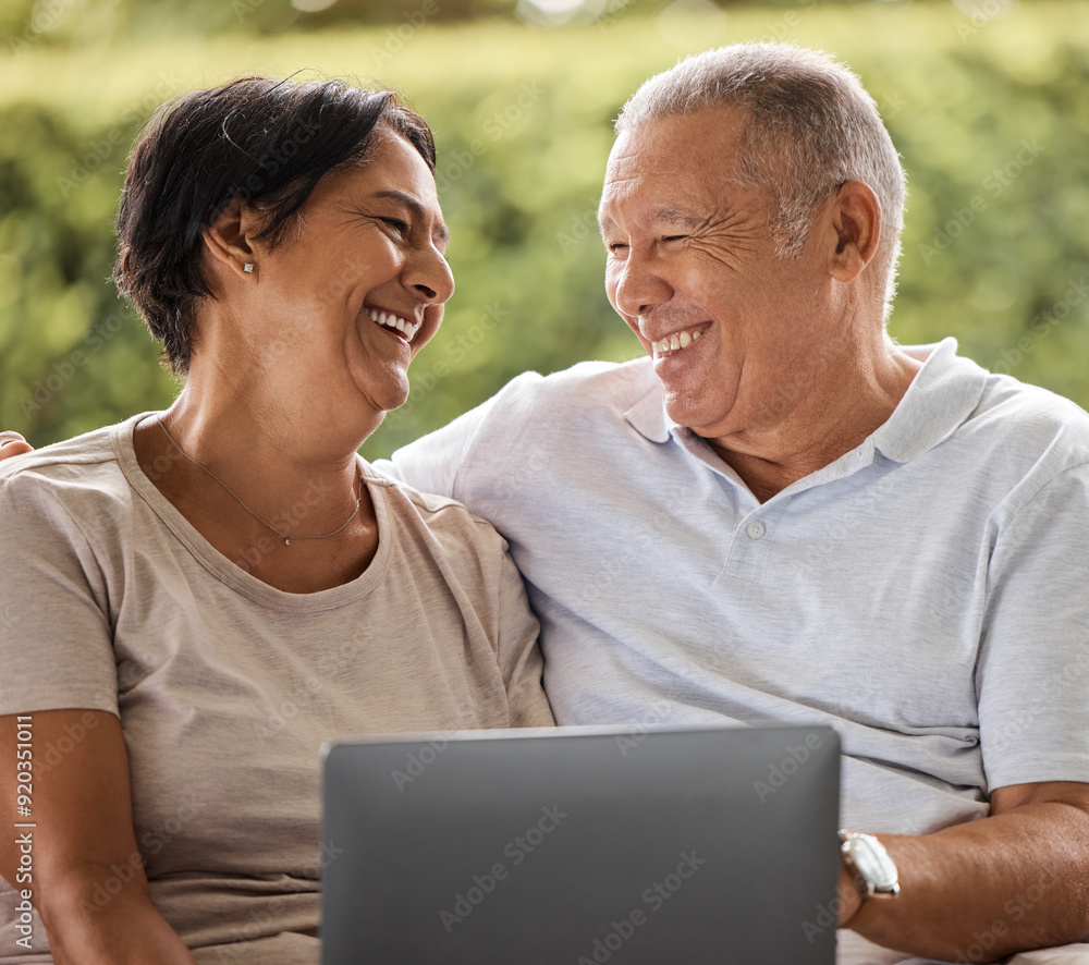 Laptop, love and smile with senior couple in garden of home together for internet or social media browsing. Funny, happy or laughing with elderly man and woman outdoor at apartment for bonding Laptop, love and smile with senior couple in garden of home together for internet or social media browsing. Funny, happy or laughing with elderly man and woman outdoor at apartment for bonding