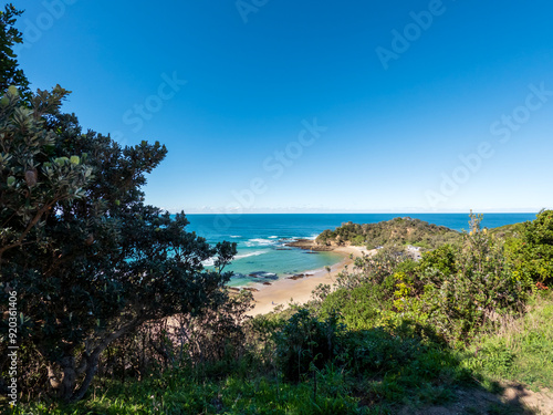 Elevated views of Shelly Beach and the Pacific Ocean from Captain Cook Lookout, a coastal gem in Nambucca Heads, NSW, Australia photo