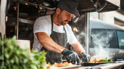 Chef inside a food truck preparing a fresh meal