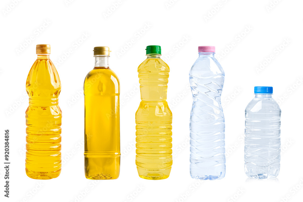 Vegetable oil and water in different bottle for cooking isolated on white background. Vegetable oil and water in different bottle for cooking isolated on white background.