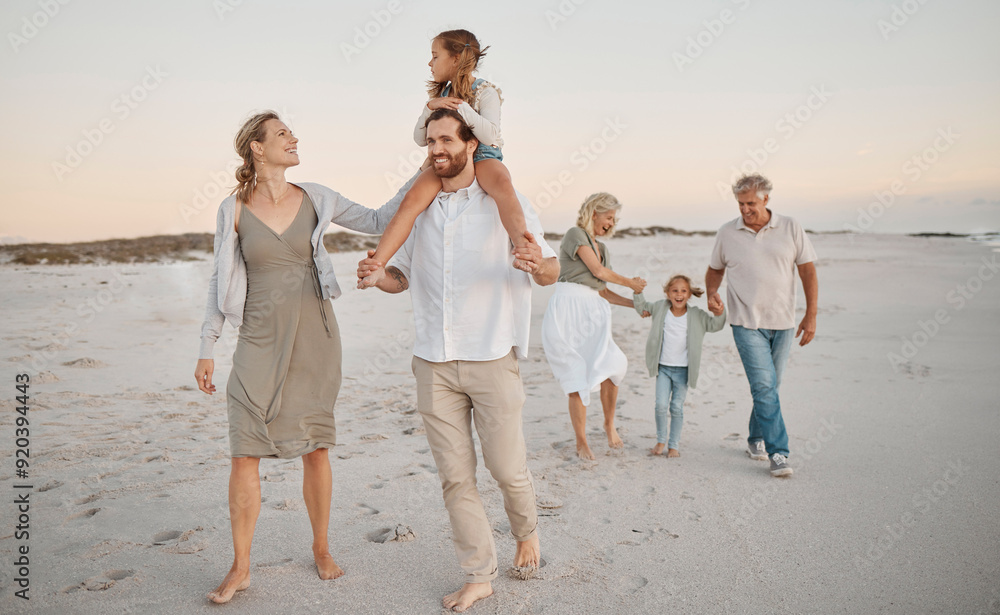© Lumeez23/peopleimages.com - Parents, grandparents and walk with kids at beach, sunset and girl on shoulders for holiday. Men, women and children on care, vacation and piggy back with holding hands for love by ocean in Spain