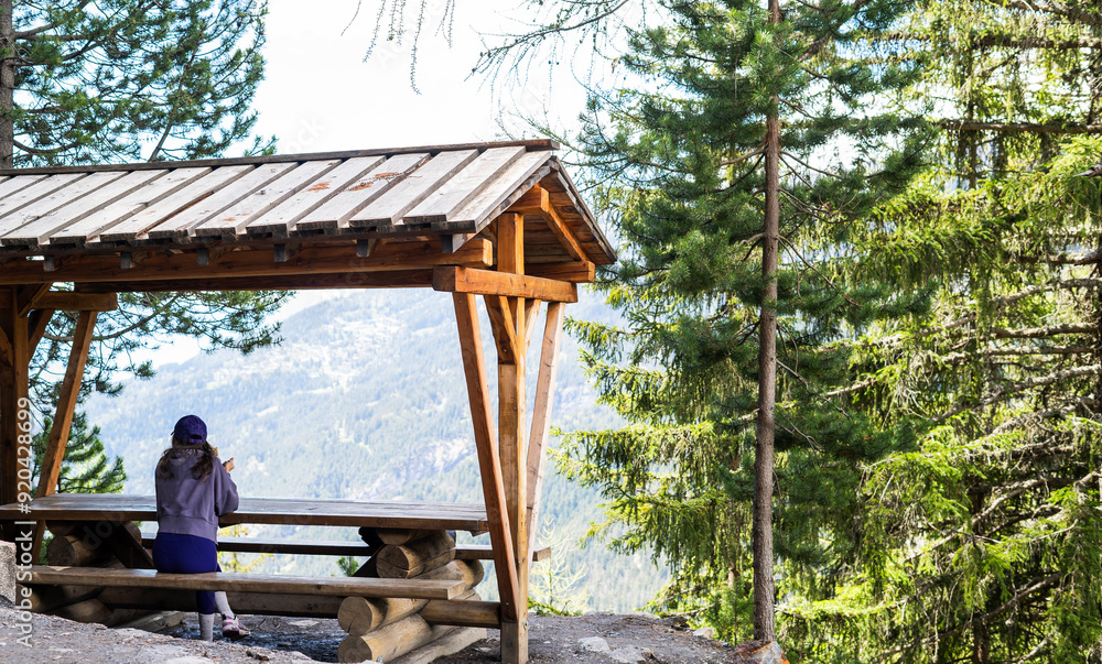 Woman enjoying landscape on a picnic rest area. Healthy lifestyle. Bisse du Rho Woman enjoying landscape on a picnic rest area. Healthy lifestyle. Bisse du Rho