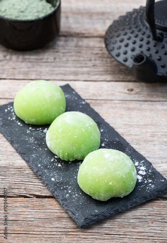 Traditional japanese desert mochi with matcha latte tea photo