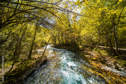 Stream under the Pearl Shoal Waterfall in Jiuzhai Valley National Park, China photo