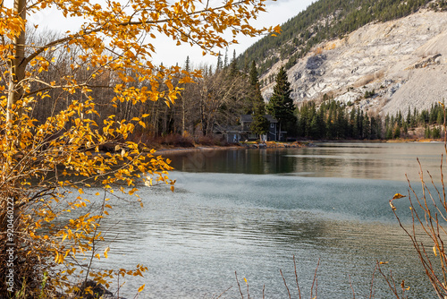 Beautiful view of the Crowsnest Lake in Crowsnest Pass, Alberta, in autumn season photo