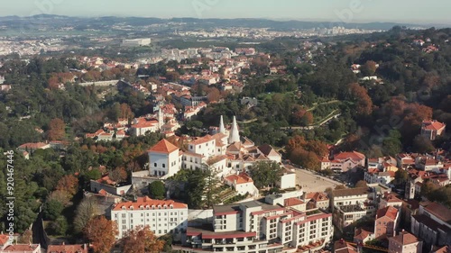 Aerial tilt and paralax shot of the National Palace of Sintra in Sintra, Portugal outside of Lisbon