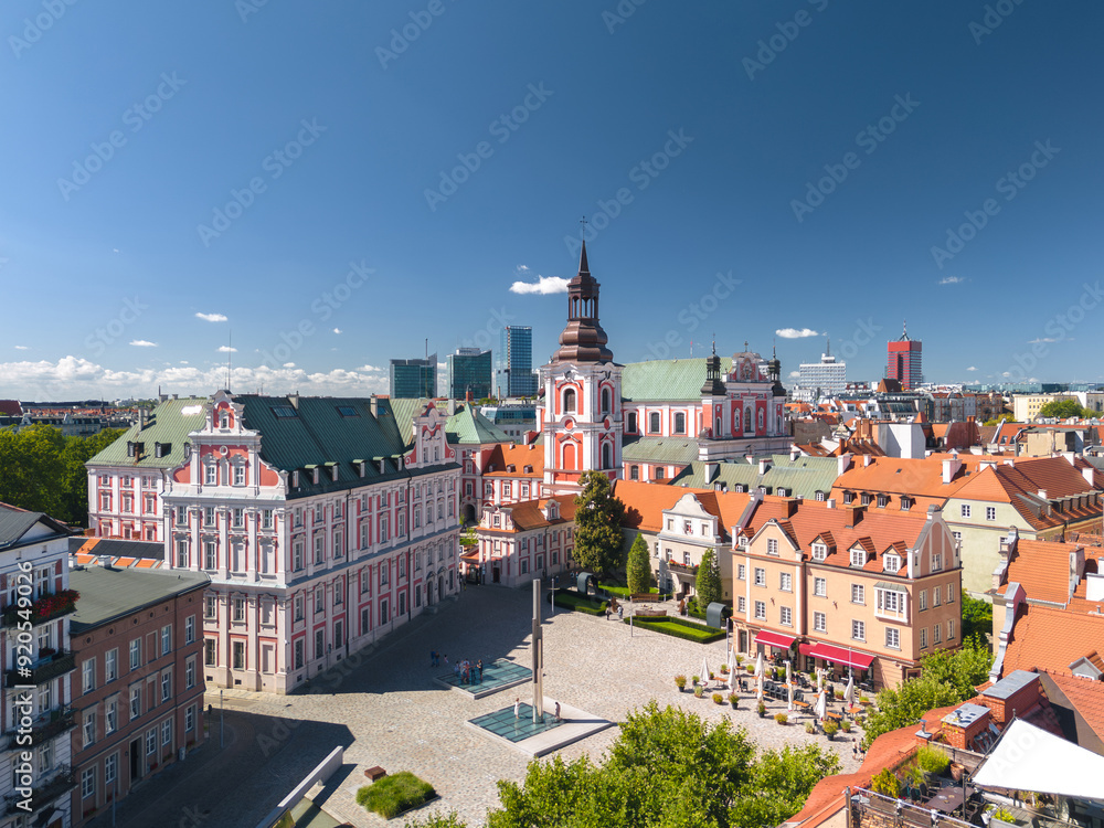 Summer skyline cityscape of Poznan (Poznań), Poland. Wide panoramic view of Plac Kolegiacki square and Basilica of Our Lady of Perpetual Help in Poznań Fara (Fara Poznańska)